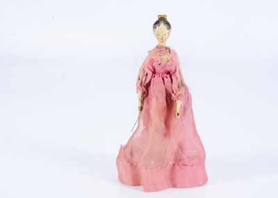 Lot 137 - An 19th century Grodnertal larger scale dolls’ house wooden doll