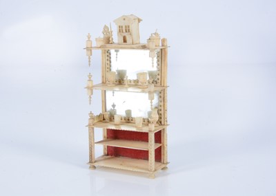 Lot 138 - An 19th century bone dolls’ house open display shelves