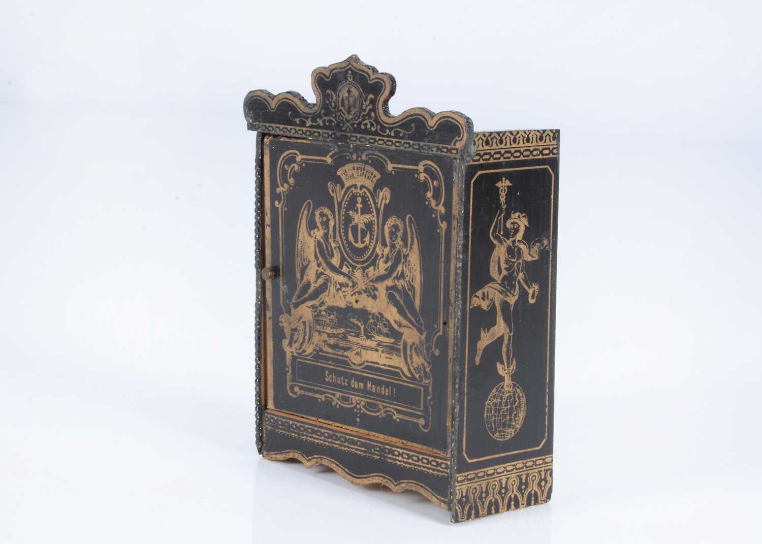 Lot 144 - An 19th century Waltershausen dolls’ house ebony music cabinet