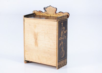 Lot 144 - An 19th century Waltershausen dolls’ house ebony music cabinet