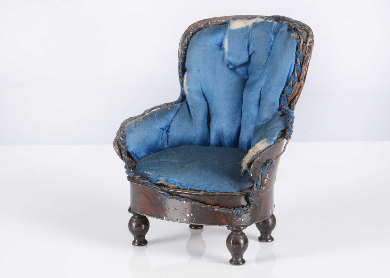 Lot 145 - An 19th century Rock & Graner painted tinplate dolls’ house arm chair