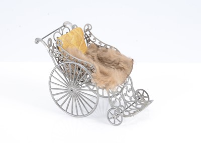 Lot 147 - An 19th century German soft metal invalid carriage