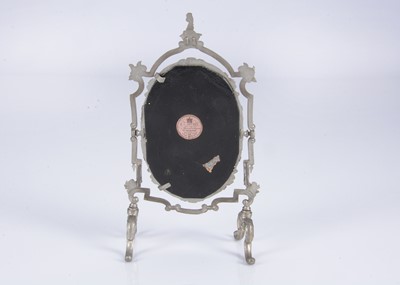 Lot 149 - An 19th century German soft metal doll’s or large dolls’ house cheval mirror