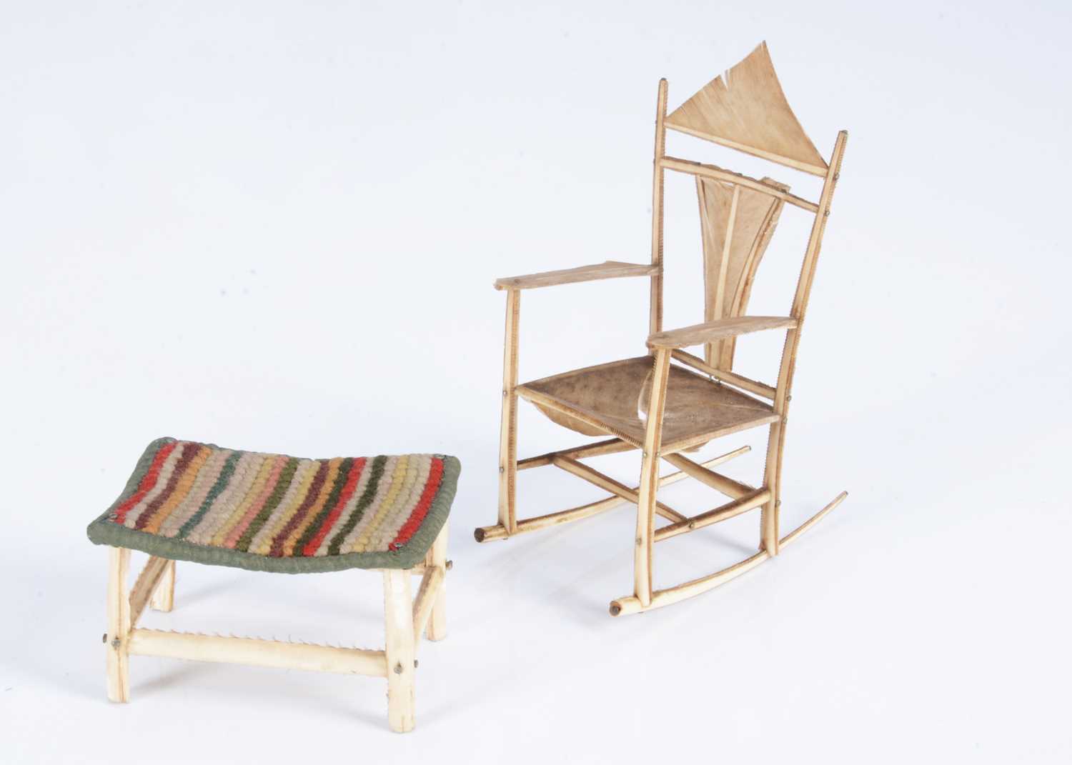 Lot 151 - An 19th century dolls’ house feather rocking chair
