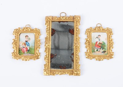 Lot 167 - A pair of late 19th century German gilt metal dolls’ house pictures
