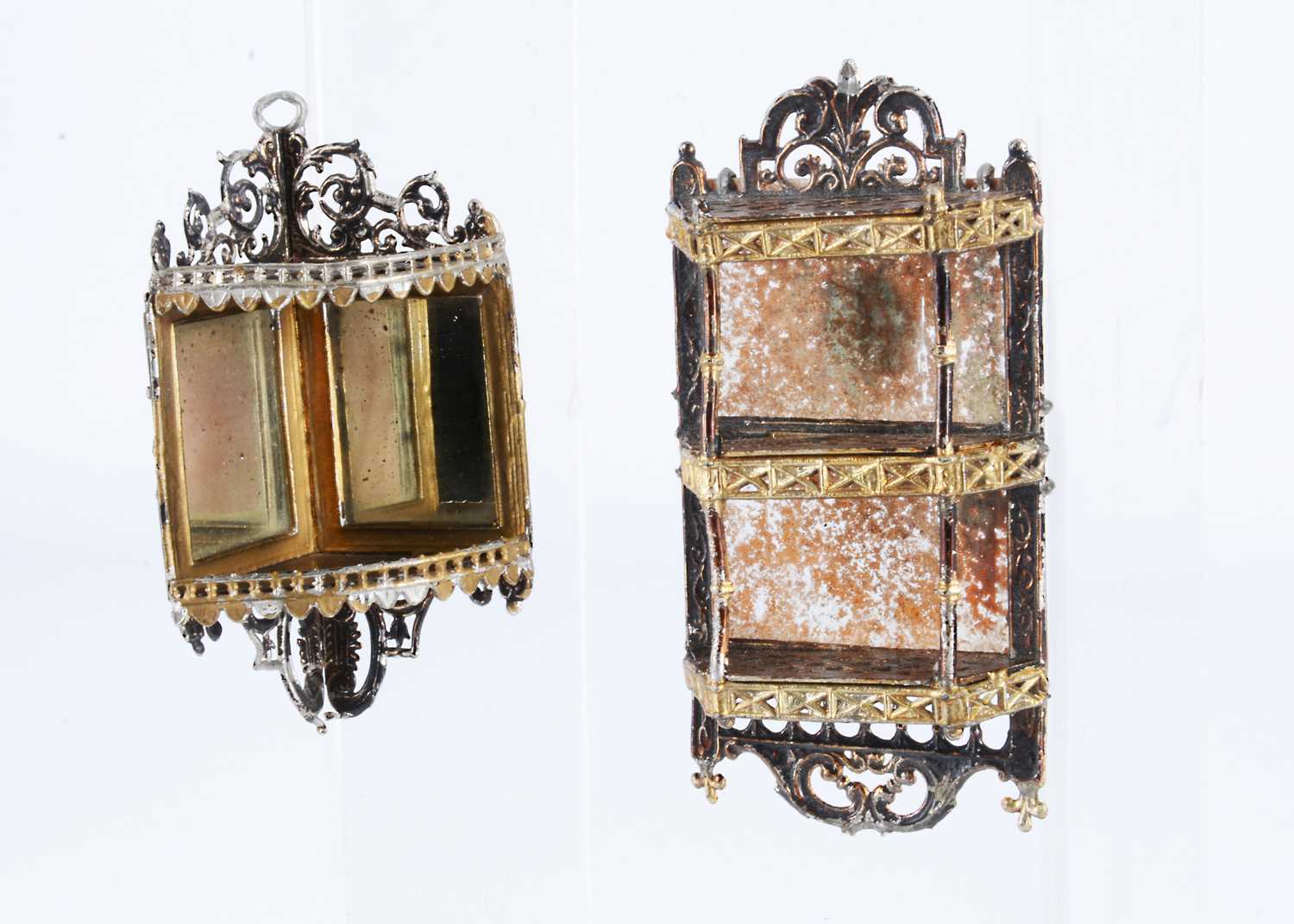 Lot 171 - Two 19th century German soft metal dolls’ house hanging shelves