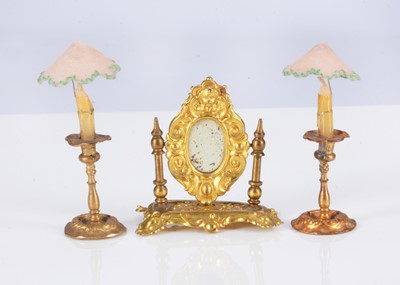 Lot 175 - A late 19th century German gilt metal dolls’ house toilet mirror