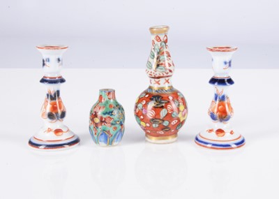 Lot 178 - Two late 19th century Continental large scale dolls’ house Imari pattern porcelain candlesticks