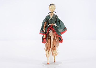 Lot 183 - An 19th century Grodnertal wooden dolls’ house doll