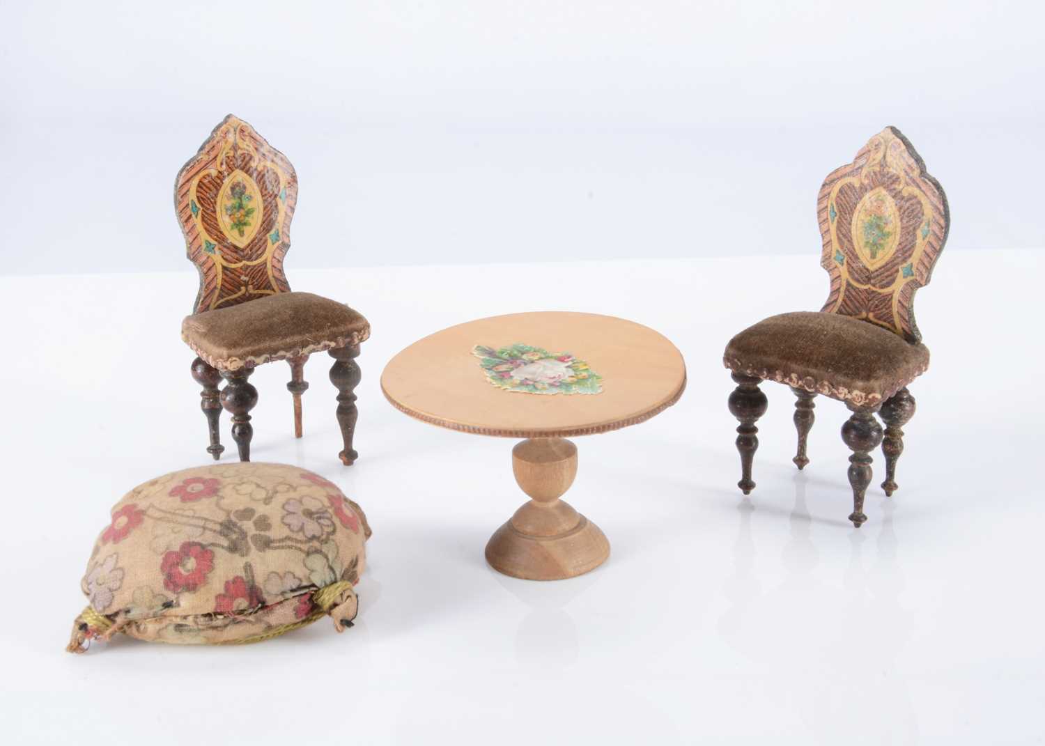 Lot 191 - Two 19th century German chromolithographic paper covered dolls’ house chairs