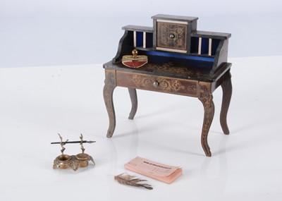Lot 194 - An 19th century Waltershausen dolls’ house desk