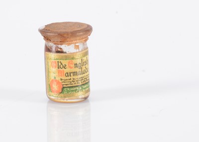 Lot 209 - A rare Queen Mary’s Dolls’ House jar of Chivers Old English Marmalade, circa 1924