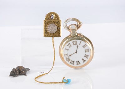 Lot 219 - A late 19th century German gilt metal dolls’ house cuckoo clock