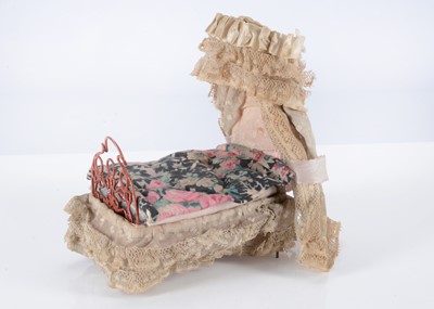 Lot 225 - An 19th century wire dolls’ house half-tester bed