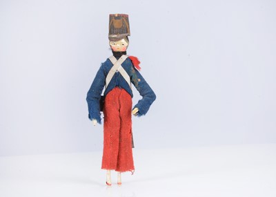 Lot 228 - A rare 19th century Grodnertal dolls’ house French Grenadier wooden soldier doll