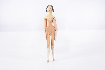 Lot 229 - An 19th century Grodnertal dolls’ house doll with ringlets
