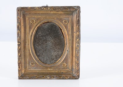 Lot 232 - An 19th century pressed brass dolls’ house frame with mirror