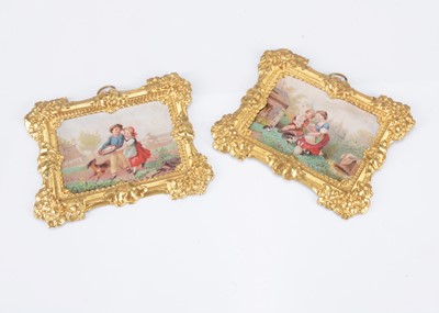 Lot 234 - A pair of late 19th century German gilt metal dolls’ house picture frames