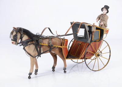 Lot 257 - A fine late 19th century French painted tinplate Hansom cab for Au Nain Bleu
