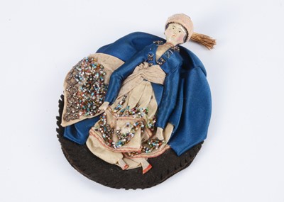 Lot 262 - An 19th century Grodnertal wooden doll penwipe