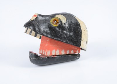 Lot 305 - An unusual late 19th century papier-mâché hand held dog head squeak toy