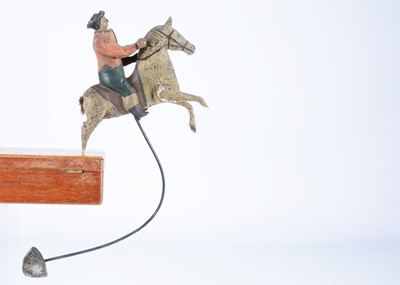Lot 306 - A rare early 19th century wooden mounted figure balancing toy