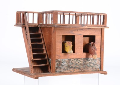 Lot 307 - A late 19th or early 20th century German farm building moo/neigh toy