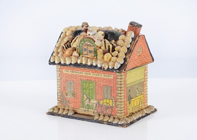 Lot 312 - A late 19th century printed card and shell ‘The American Cow Puzzle Dairy’ house box