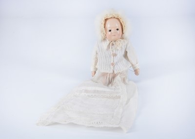 Lot 322 - A mid 19th century papier-mâché  Motschmann Taufling baby doll