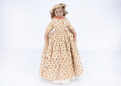 Lot 323 - A mid 19th century English poured wax child doll, possibly Montanari