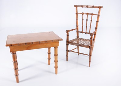 Lot 331 - A French faux bamboo doll’s chair and table, circa 1900