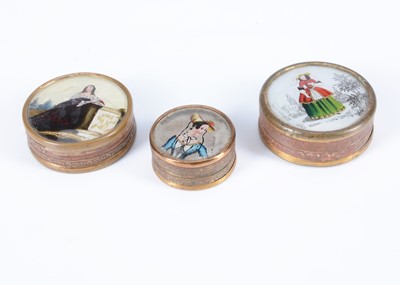 Lot 336 - Three 19th century circular card boxes with glass reverse printed lids