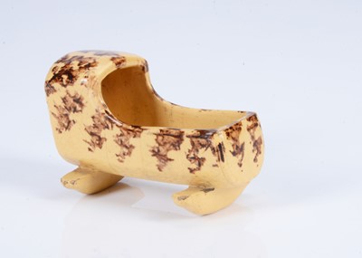 Lot 344 - An 19th century spongeware pottery dolls’ house cradle