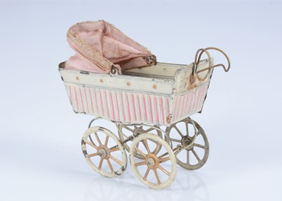 Lot 345 - An early 20th century German tinplate doll’s perambulator