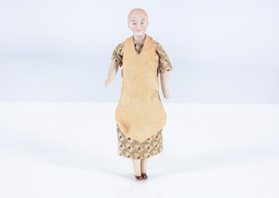 Lot 349 - A 1920s German bisque shoulder-head dolls’ house mother doll