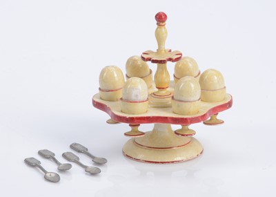 Lot 354 - An 19th century German turned wooden dolls’ house egg stand