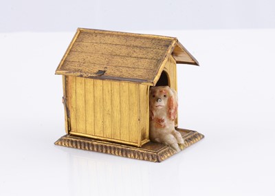 Lot 355 - A late 19th century Erhard & Sohne gilt metal dolls’ house dog kennel