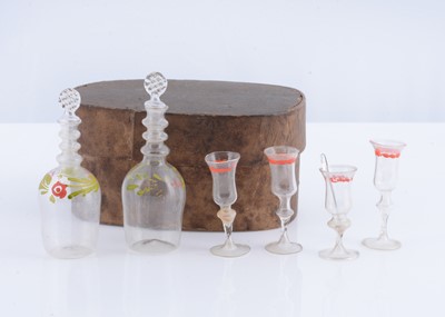 Lot 356 - An 19th century German dolls’ house decanters and glasses in split wood box