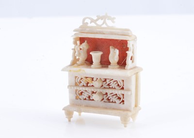 Lot 362 - A late 19th century miniature bone doll’s house dresser