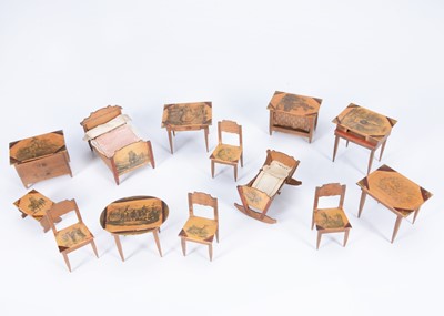 Lot 365 - A very rare early 19th century German dolls’ house set of furniture with transfer print decoration