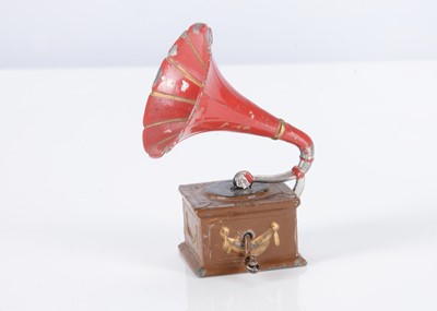 Lot 366 - A Plank cast-metal dolls’ house horn gramophone