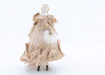 Lot 369 - An 19th century German bisque shoulder-head dolls’ house doll
