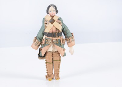 Lot 372 - An 19th century German composition headed dolls’ house doll dressed as a 17th century gentleman