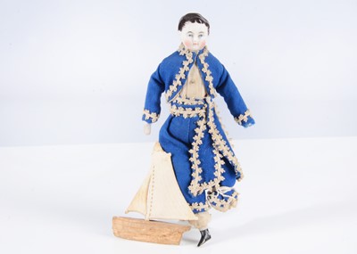 Lot 379 - An 19th century German bisque shoulder-head dolls’ house boy doll