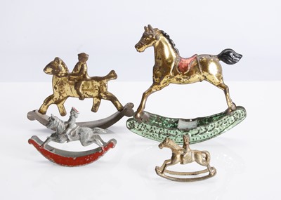 Lot 383 - Four Penny Toy dolls’ house rocking horses