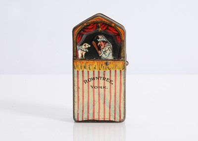 Lot 391 - A rare Rowntree lithographed tinplate Punch and Judy booth miniature chocolate tin