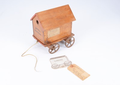 Lot 399 - A late 19th century or early 20th century wooden toy bathing machine