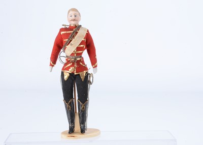Lot 402 - A fine German bisque shoulder-head dolls’ house soldier doll