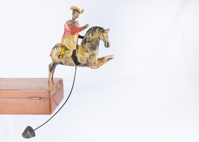 Lot 405 - A rare early 19th century wooden mounted soldier balancing toy