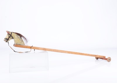 Lot 411 - An early 20th century English carved wooden hobby horse
